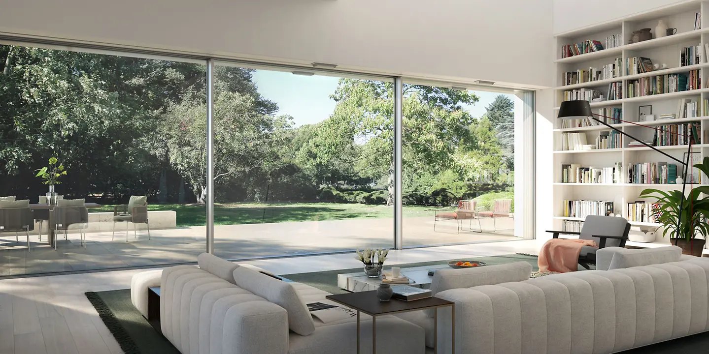 Minimal sliding glazing opening a contemporary interior to a garden